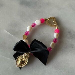 Pearl and bow bright pink bag charm